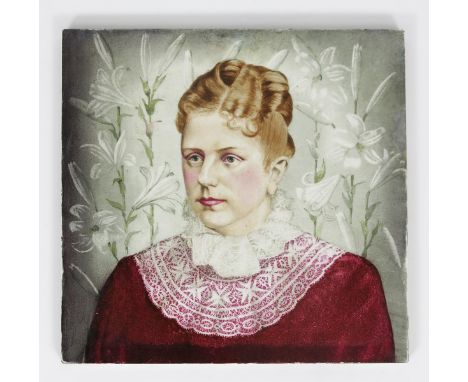 A large Minton Hollins &amp; Co portrait tile,  painted with a Victorian lady in red dress with lace collar, before tall stem