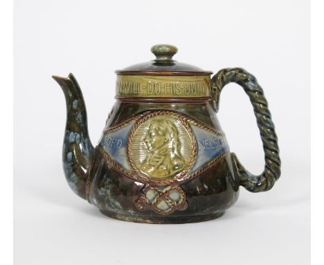 A Royal Doulton stoneware commemorative Admiral Lord Nelson teapot and cover,  with rope handle, modelled in low relief with 