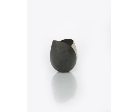 ‡ John Ward (born 1938) a hand-built stoneware tulip vase, black and white geometric panels, impressed seal mark, 21cm. high 