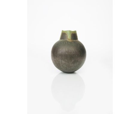 ‡ John Ward (born 1938) a hand-built stoneware vase, ovoid with tapering square neck, covered in a black metallic glaze, the 