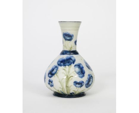 'Blue Poppy' a James Macintyre &amp; Co Florian Ware vase designed by William Moorcroft, painted in shades of blue and green 