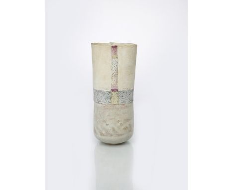 ‡ Robin Welch (born 1936) a stoneware vase, elliptical section, slightly waisted cylindrical form, white glaze with  blue tex