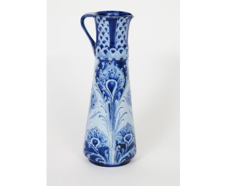 'Peacock Feather' a James Macintyre &amp; Co Florian Ware ewer designed by William Moorcroft, tapering cylindrical form, tube