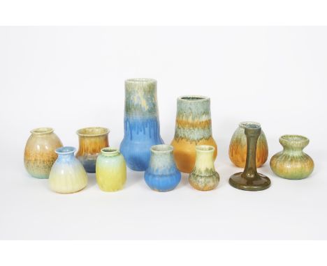 A Ruskin Pottery crystalline glaze vase, dated 1930, ovoid with tapering neck, glazed blue graduating to sand yellow, a candl