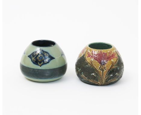 'Cornflower' a James Macintyre &amp; Co vesta designed by William Moorcroft, painted in shades of red and green on a sand gro