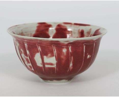 ‡ David Leach OBE (1911-2005) a Lowerdown Pottery cut-sided porcelain bowl, covered in a reduced copper glaze impressed seal 