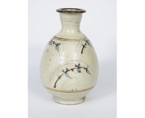 ‡ Jim Malone (born 1946) an Ainstable Pottery  stoneware bottle vase, incised and painted with arched foliate spray repeat in