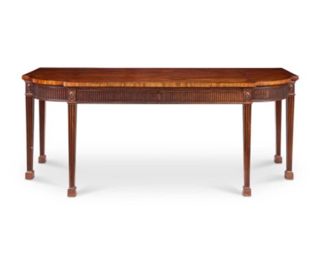 A GEORGE III MAHOGANY BREAKFRONT SERVING TABLE  CIRCA 1780   Of D-shaped outline, the top banded and line-inlaid, formerly wi