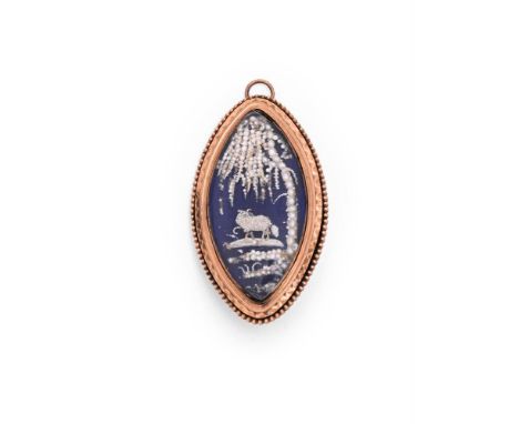 A LATE 18TH CENTURY SEED PEARL AND BLUE ENAMEL BROOCH  The marquise shaped blue enamelled ground with applied seed pearls in 