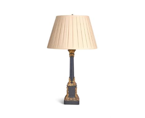 A GILT AND PATINATED METAL LAMP  FRENCH, LATE 19TH CENTURY AND LATER  Converted for electricity with twin light fitting  lamp