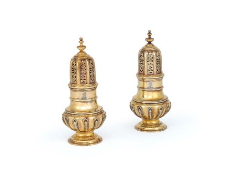 A PAIR OF SILVER-GILT BALUSTER CASTERS R. & S. GARRARD & CO. (SEBASTIAN HENRY GARRARD), LONDON 1912  With knopped finials to 