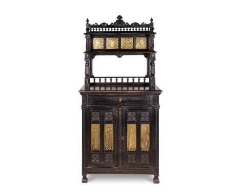 JAMES SHOOLBRED & CO- AN AESTHETIC MOVEMENT EBONISED OAK SIDE CABINET  CIRCA 1880  The design attributed to H W Batley, James