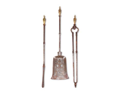 A VICTORIAN SET OF THREE GILT METAL HANDLED STEEL FIRE TOOLS  CIRCA 1860-1880  Urn handles  shovel 74cm long   Condition Repo