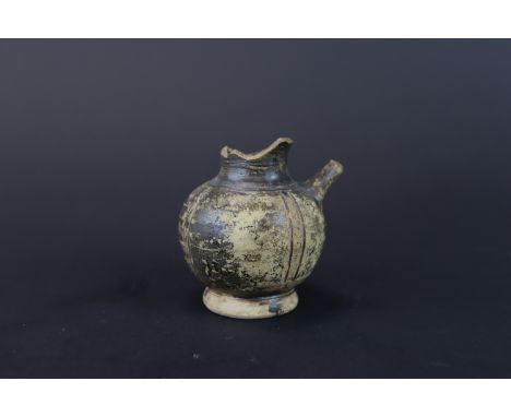 A Greek Black-glazed Ewer, Circa 300-100 B.C.  H:7.5cm, W:6cm  Old broken at neck  Collection of Gabriele und Wolfgang Leiner