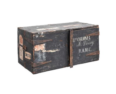 An Early 20th Century Military Ebonised Pine Campaign Chest, with metal mounts, the fascia with two hinged doors painted and 