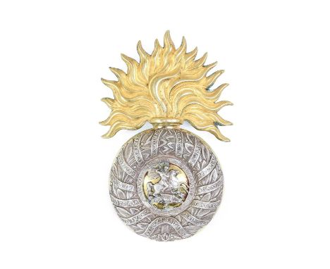 A Good 5th Northumberland Fusiliers Officer's Albert Pattern Shako Badge, with gilt flaming grenade set with silver metal lau