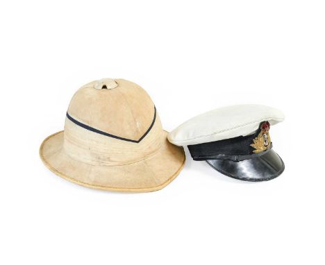 An Early 20th Century Wolseley "Conforma" Pith Helmet, in cream cloth with six panelled top, the seven band pugaree with blac