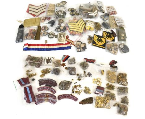 A Large Quantity of Second World War and Later British Army Embroidered Rank and Cloth Insignia, including chevrons, pips, sh