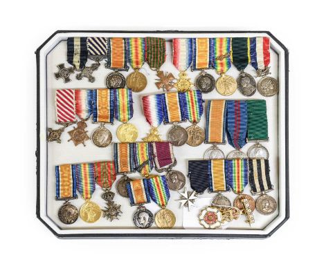 A Collection of Thirty Two First/Second World War Miniature Medals in Nine Groups, including DSC, DFC, British War Medal, Vic