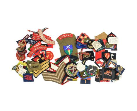 A Collection of Second World War and Later British Army Cloth Insignia, embroidered, woven and printed, comprising approximat