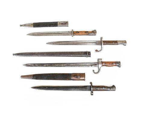 A French M1892 Second Pattern Bayonet, with notched fullered steel blade, steel hilt with hooked quillon and steel scabbard; 