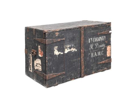 An Early 20th Century Military Ebonised Pine Campaign Chest, with metal mounts, the fascia with two hinged doors painted and 