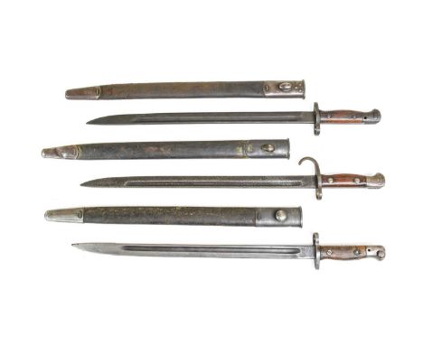 Three British 1907 Pattern Sword Bayonets, one with hooked quillon and with pitted steel blade, the other two marked SANDERSO
