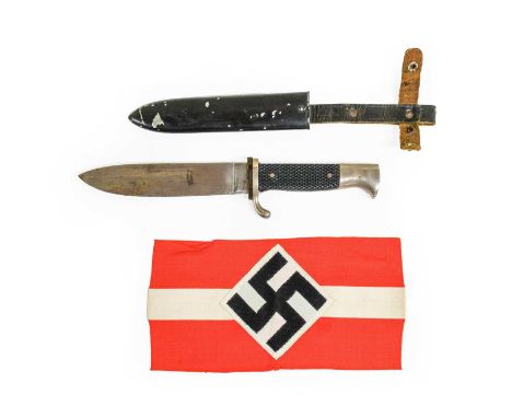A Second World War German HJ Knife, the 13.5cm plain steel blade maker marked Hubecho, Solingen, the white metal hilt with ch