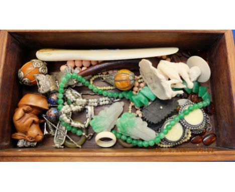 A qty of  Coral, Jade and Amber items in box