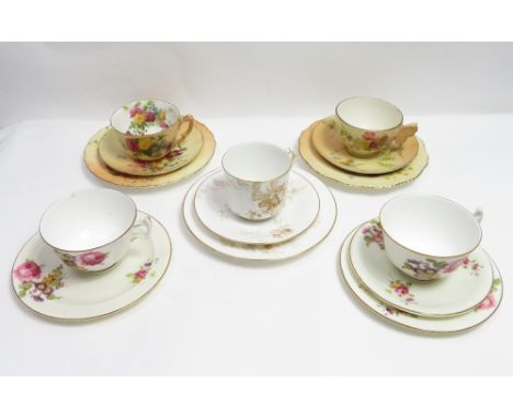 A collection of Royal Worcester tea cup and saucers, including blush ivory