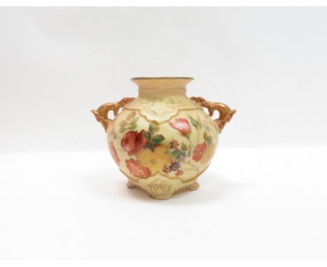 A Royal Worcester blush ivory two handled vase, decorated with fern leaves and flowers, shape 1176