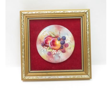 A Royal Worcester plaque of fruit study, signed T. Nutt, 9cm diameter