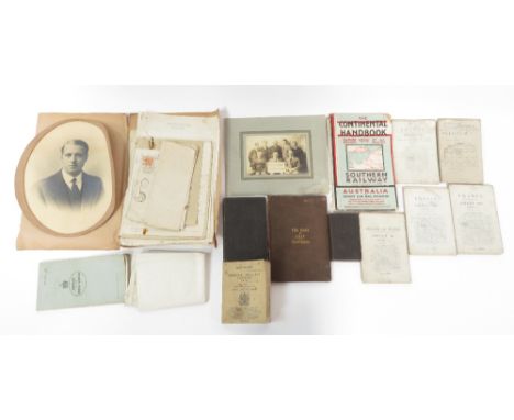 A collection of ephemera including maps, photographs, army books and other items