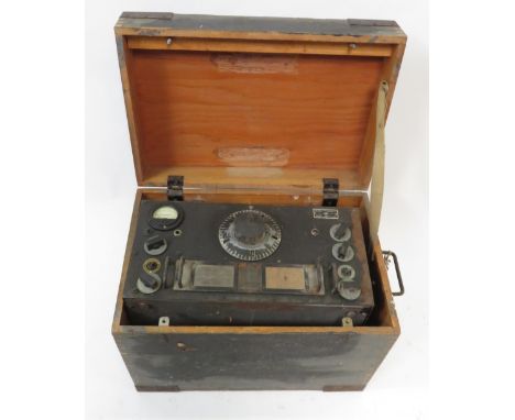 A military national high frequency receiver, type HRO - 5T, in a fitted pine case; with speaker and transformer
