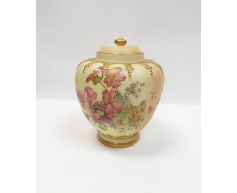 A Royal Worcester vase, decorated with sprays of flowers, shape number 1312, 17cm high