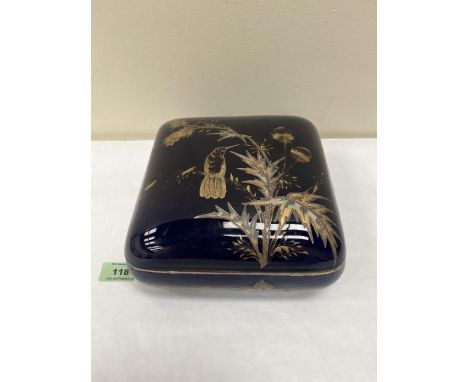 A French porcelain box, gilded with bird, flying insects and foliage on a cobalt ground. 8' wide. Probably K &amp; Luneville 