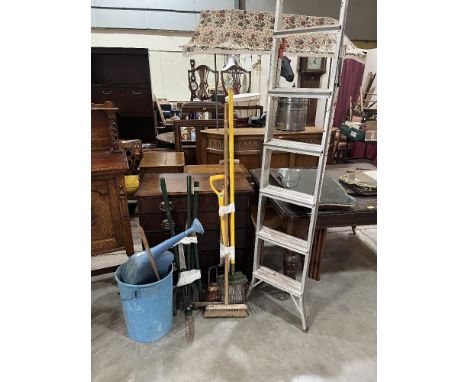 A quantity of garden tools, step ladder etc.