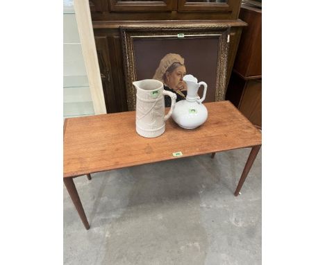 A 1970s low table, a gilt frame and two ceramic jugs (4)