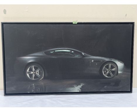 CHRISTIAN SCHWETZ. BRITISH 1967-2022 An Aston Martin. Photographic print on paper. 25' x 46½'. Prov: The artist's studio