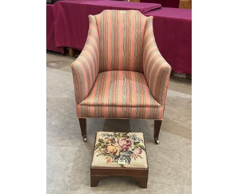 An Edward VII upholstered armchair and a mahogany tapestry seat stool