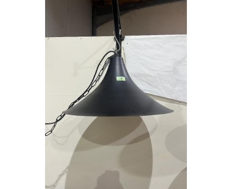 An Emporio Arts black painted metal hanging lamp. 19½' diam.