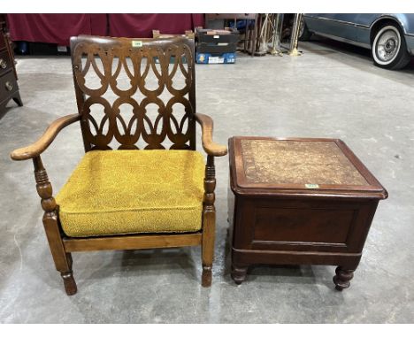 A 1920s elbow chair and a Victorian mahogany commode