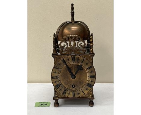 A brass lantern clock with Smiths movement. 9¾' high