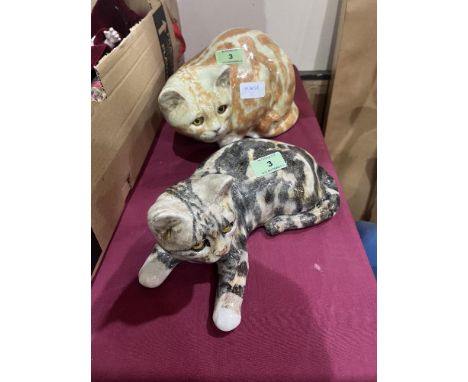 Two ceramic cats with glass eyes. Signed to bases