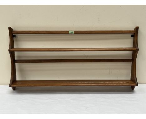 An Ercol plate rack. 38' wide. 