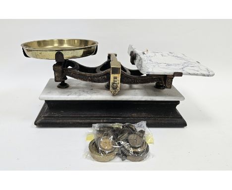 Set of early 20th century Parnall &amp; Sons Ltd of Bristol balance scales, having a brass pan and ceramic plate, on a marble