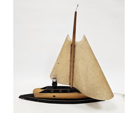 Art Deco-style oak and ebonised table lamp&nbsp;in the form of a sailing boat with celluloid shade sails, 54cm high&nbsp;