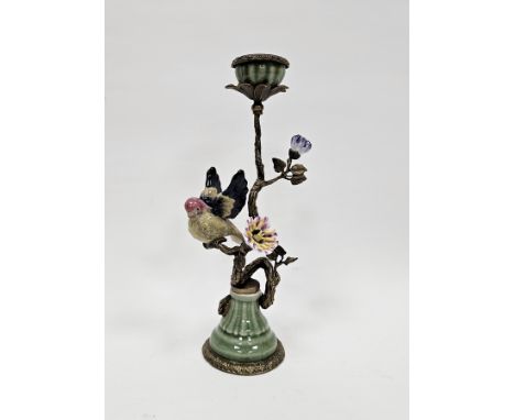 20th century continental porcelain model of a bird perched on a gilt metal candlestick branch, on celadon glazed dome gadroon