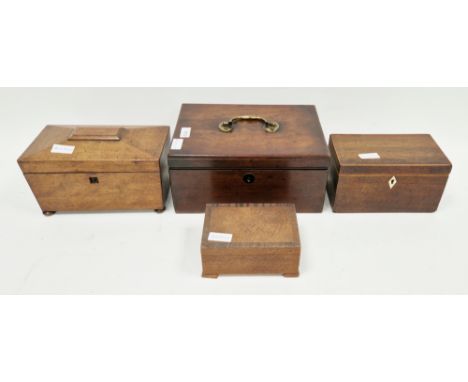 Late 19th century mahogany sarcophagus-shaped tea caddy&nbsp;with two lidded compartments to the interior, on bun feet, 23cm 