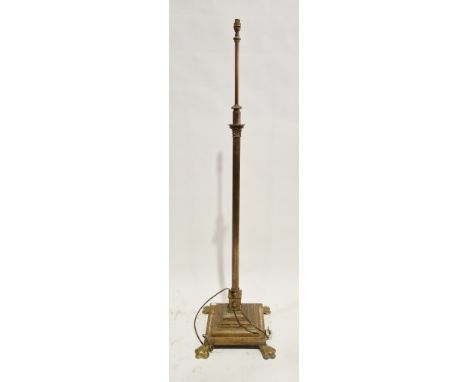Early 20th century brass standard lamp&nbsp;with reeded corinthian column, on square stepped base, with paw feet, 157cm high&